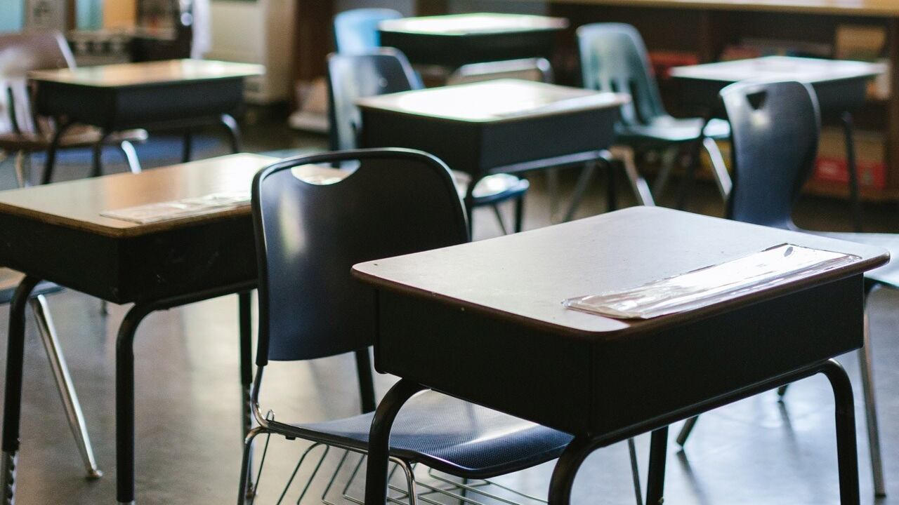 Middle school principal arrested on public intoxication, child neglect charges