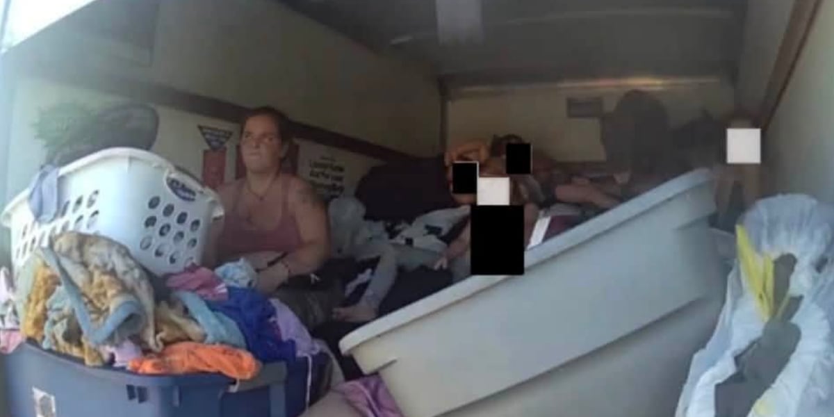 2 charged after 4 children found in back of U-Haul box truck